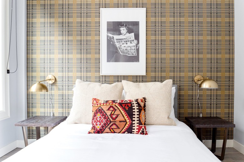 Eclectic bedroom with plaid wallpaper